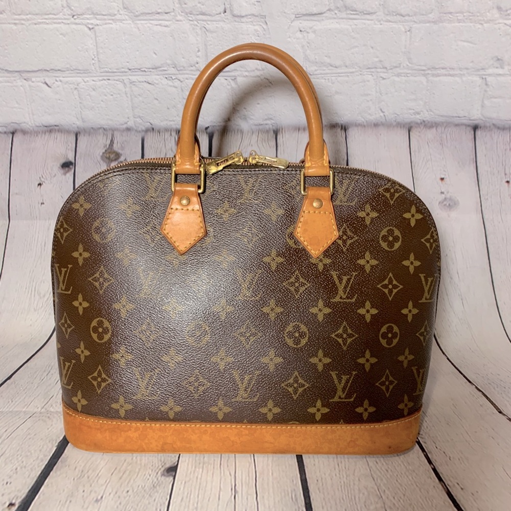 Authentic Louis Vuitton Alma Handbag